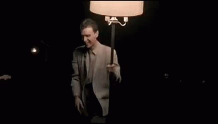 David Byrne dances with a floor lamp in Stop Making Sense.